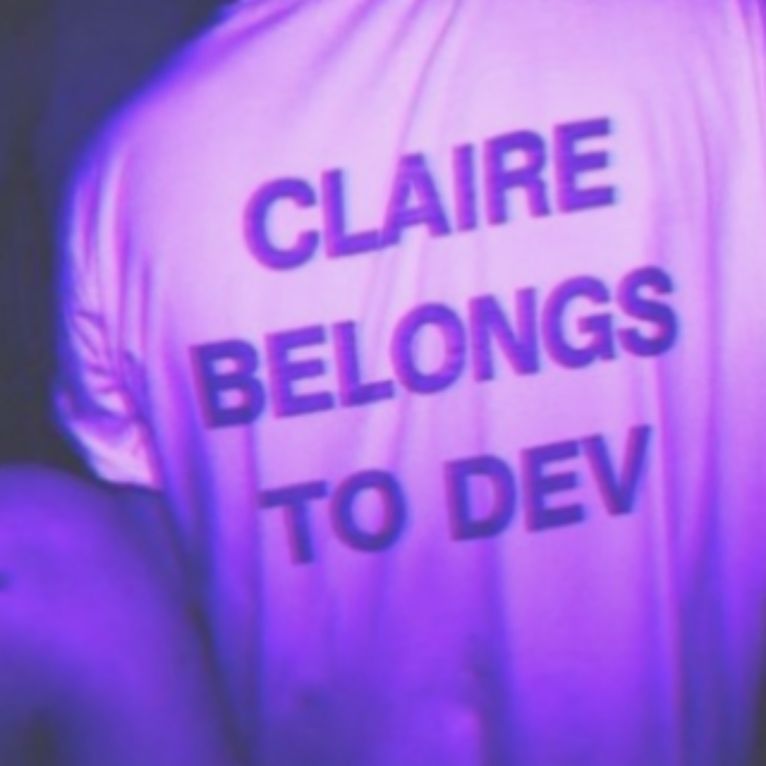 Purple-tinted portrait with the words Claire belongs to Dev